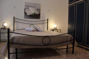 Ліжко або ліжка в номері Antico Borgo