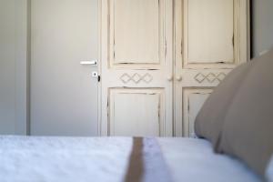 A bed or beds in a room at Lemon Factor Sorrento