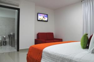 TV a/nebo společenská místnost v ubytování Hotel Atlantic Lux
