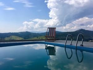 The swimming pool at or close to Private Cottage 375