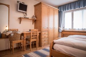 Postel nebo postele na pokoji v ubytování Appartamento Rose Di Bosco