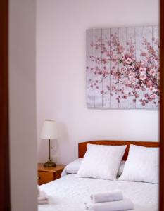 Llit o llits en una habitació de Ayfa Apartment