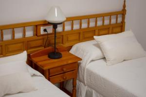 Postel nebo postele na pokoji v ubytování Ayfa Apartment