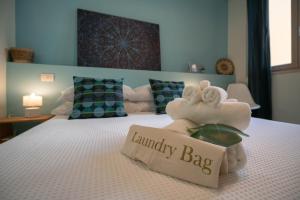 A bed or beds in a room at Sea Station