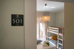 A bed or beds in a room at Sea Station