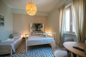 A bed or beds in a room at Sea Station
