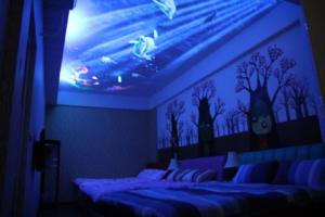 Postel nebo postele na pokoji v ubytování Miaoli Sanyi Bo Wu Guan Homestay