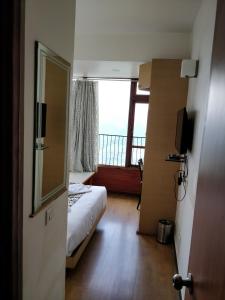 Hotel Ninamma客房内的一张或多张床位