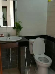 Koupelna v ubytování Pluluang Mansion