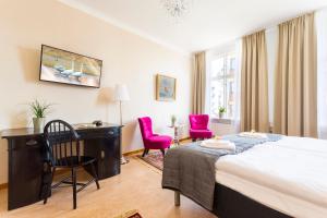 Postel nebo postele na pokoji v ubytování Hotell Drottninggatan 11