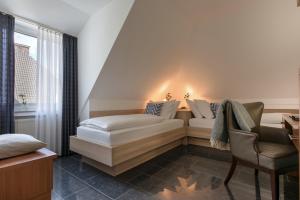 Postel nebo postele na pokoji v ubytování Hotel Europa