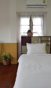 Postel nebo postele na pokoji v ubytování DoubleTree House