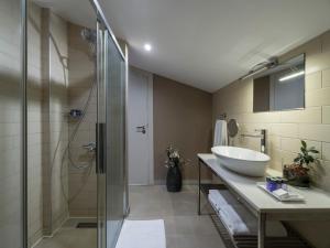 Ванная комната в Upsuites Hotel