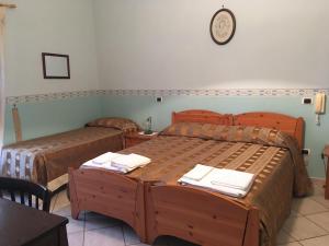 Postel nebo postele na pokoji v ubytování Carretiello