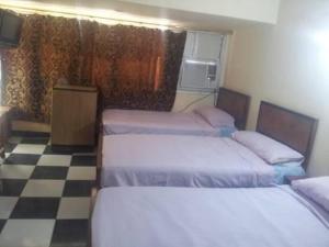 Ένα ή περισσότερα κρεβάτια σε δωμάτιο στο Nubian oasis hotel +20 φωτογραφίες