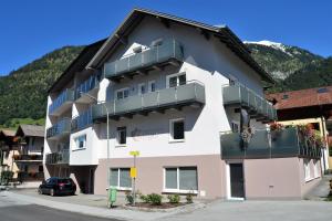 a building with balconies on the side of it at Appartements Steiger in Bad Hofgastein