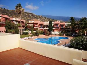 a view of a resort with a swimming pool at VV Sweet Tabaiba "by henrypole home" in Los Cancajos