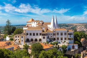 a view of a building with two white towers at Charming Home in Sintra Village in Sintra