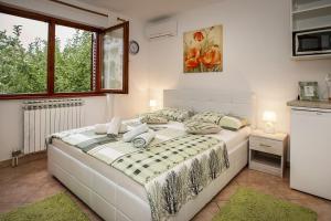 Katil atau katil-katil dalam bilik di Apartments Juranic I +40 gambar