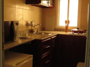 Cucina o angolo cottura di Al Ferdous Hotel Apartments