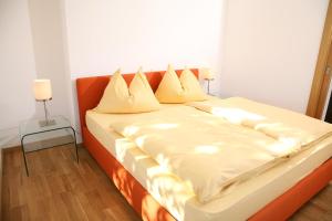 Un pat sau paturi într-o cameră la Villa Cattina