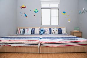 Postel nebo postele na pokoji v ubytování Dan Bao Homestay