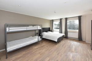 Cama ou camas em um quarto em Måby Park Hotel Arlanda