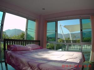 Postel nebo postele na pokoji v ubytování 1st House of Happiness at Khao Yai 1-4 bed open 1 bedroom for each 2 adults