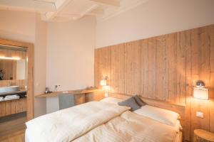 Postel nebo postele na pokoji v ubytování Hotel La Romantica