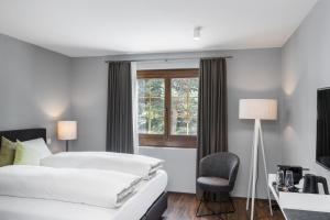 Katil atau katil-katil dalam bilik di Hotel Mischun