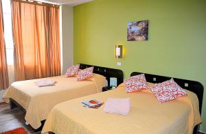 Postel nebo postele na pokoji v ubytování Hostal Terra 3 - BASE AÉREA