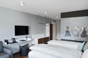 Katil atau katil-katil dalam bilik di Hotel Mischun
