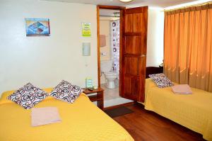 Voodi või voodid majutusasutuse Hostal Terra 4 - EL LABRADOR toas