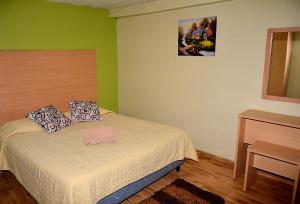 Voodi või voodid majutusasutuse Hostal Terra 4 - EL LABRADOR toas