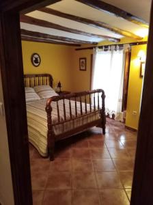 Ένα ή περισσότερα κρεβάτια σε δωμάτιο στο Casa Tiretes