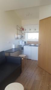 A kitchen or kitchenette at Vatnsás 10