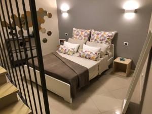 A bed or beds in a room at Giader's House - Free Parking