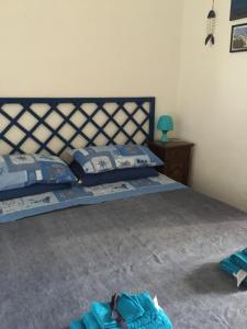 A bed or beds in a room at Al Baglio low cost