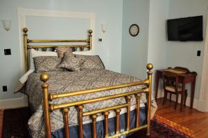 Säng eller sängar i ett rum på Hawksbill House - (Adults Only)
