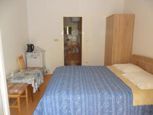Posteľ alebo postele v izbe v ubytovaní Apartments & Room Španjol