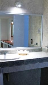 Ванна кімната в Hotel Aristos Acapulco