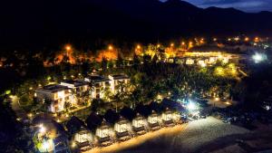 una vista aérea de un complejo por la noche con luces en Casa Marina Resort en Quy Nhon