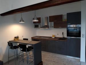 Kuchyňa alebo kuchynka v ubytovaní Apartman Mohenski