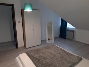 Posteľ alebo postele v izbe v ubytovaní Apartman Mohenski