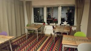 Ein Restaurant oder anderes Speiselokal in der Unterkunft Gästehaus HarzGlück 