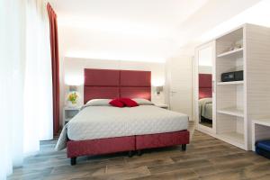 Säng eller sängar i ett rum på Guest House DOLCE LAGUNA 2