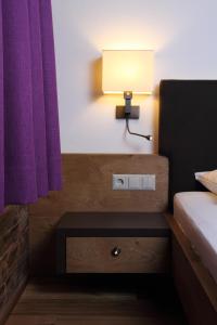 Postel nebo postele na pokoji v ubytování Hotel Kirchenwirt