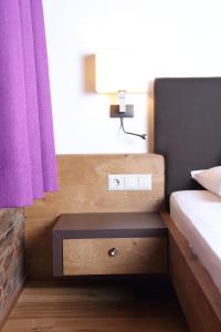 Postel nebo postele na pokoji v ubytování Hotel Kirchenwirt