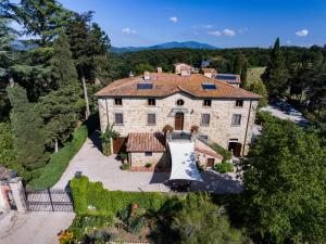 an aerial view of a large stone house at Casa Vacanze Villa Maria in Anghiari