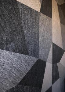 a black and white checkered floor with at S'accabbadora Guest House in Alghero